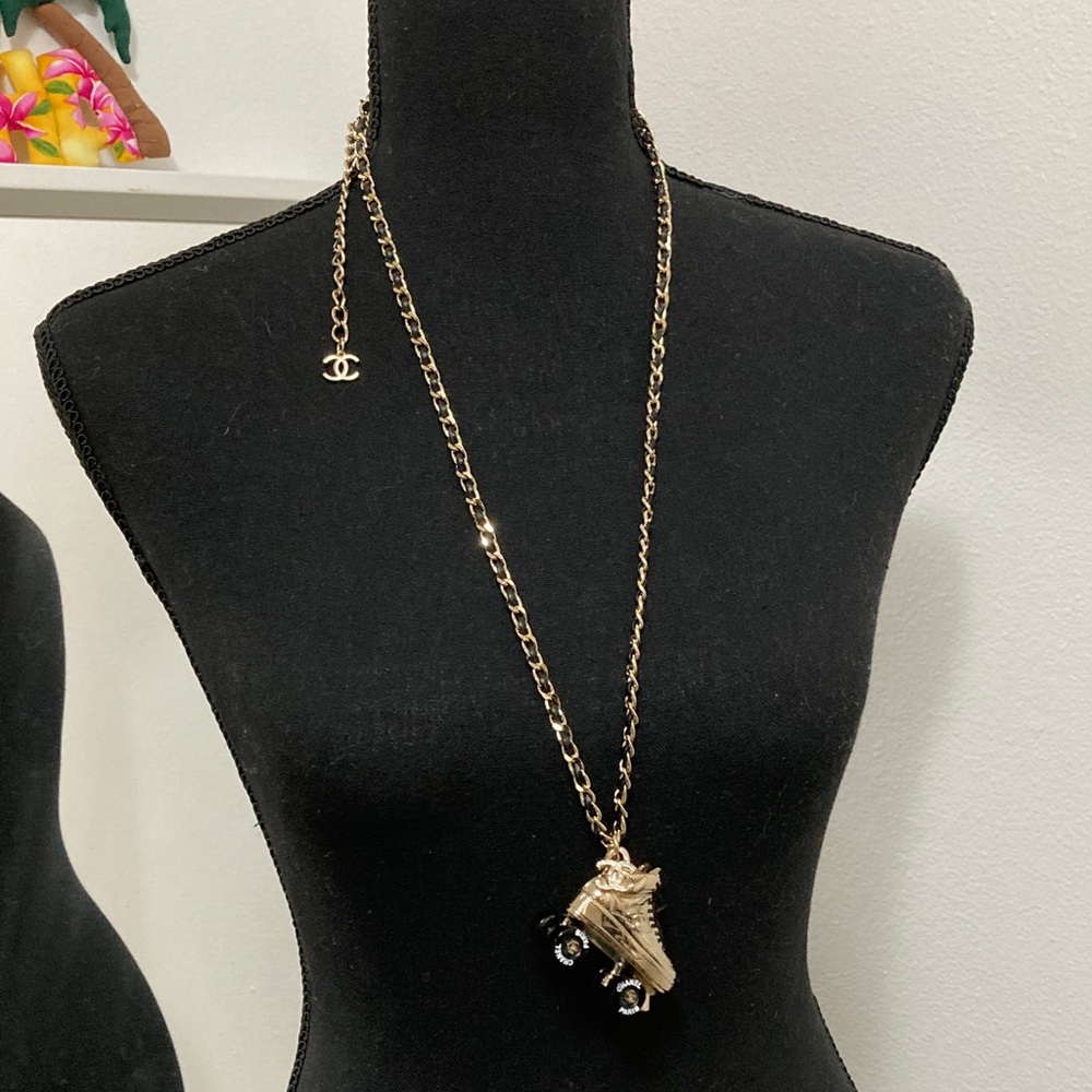 CHANEL Gold Necklace with Skating Shoe Pendant